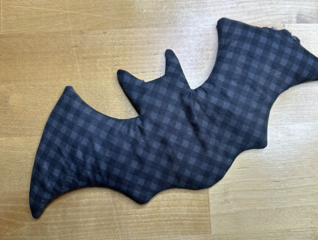 Fabric bat ironed flat