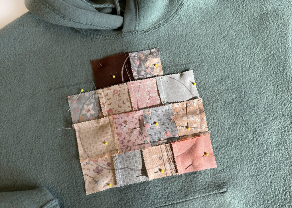 Patchwork block pinned into place for NE210 Applique Project
