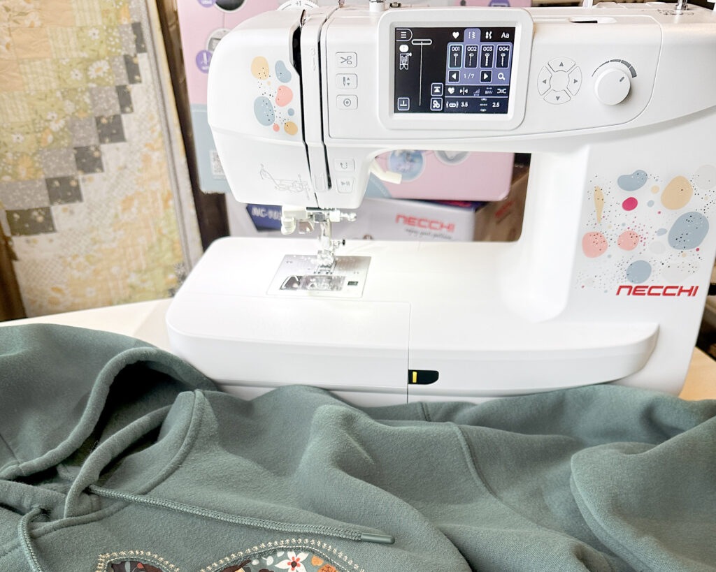 NE210 Sewing and Embroidery machine used to create applique hoodie
